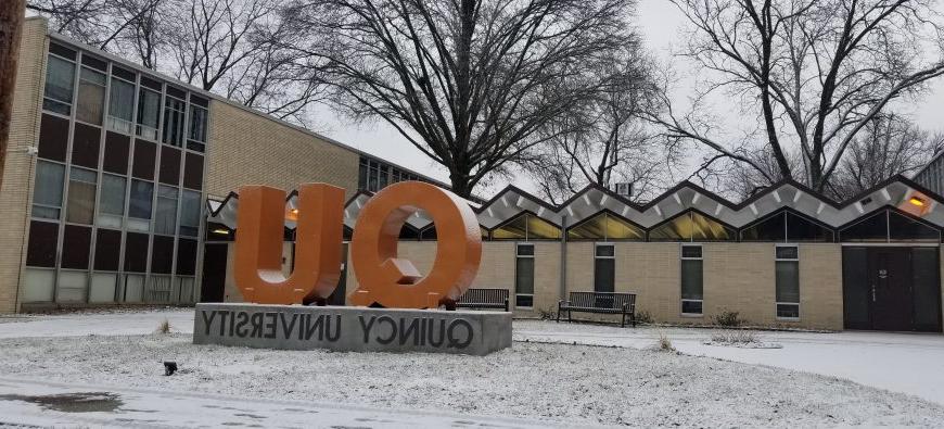 QU Sign in front of Helein Hall Winter Time